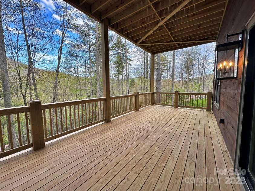 371 Hews Circle, Blowing Rock, NC 28605.  MLS# CAR4196157, YatesRealty ID 1884. Lower Deck off lower living
