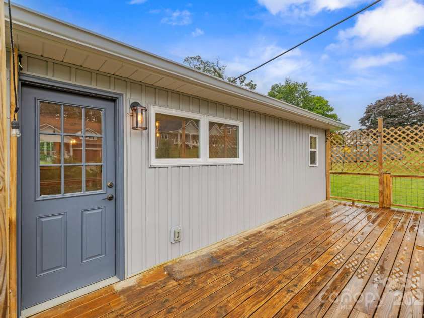 3471 & 3473 Chimney Rock Road, Hendersonville, NC 28792.  MLS# CAR4265004, YatesRealty ID 18841. Back Porch - 3473
