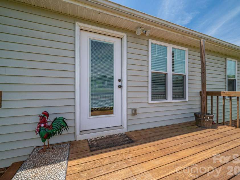 2486 Rock Dam Road, Lincolnton, NC 28092.  MLS# CAR4335118, YatesRealty ID 18846. Back deck