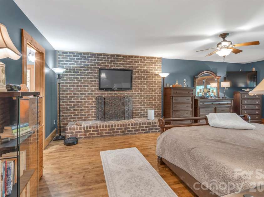 105 Winchester Drive, Shelby, NC 28152.  MLS# CAR4375983, YatesRealty ID 18850. Primary bedroom with gas log fireplace on main level