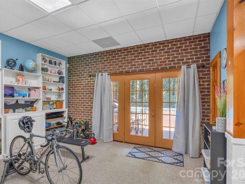 105 Winchester Drive, Shelby, NC 28152.  MLS# CAR4375983, YatesRealty ID 18850. Walk out from basement to pool area