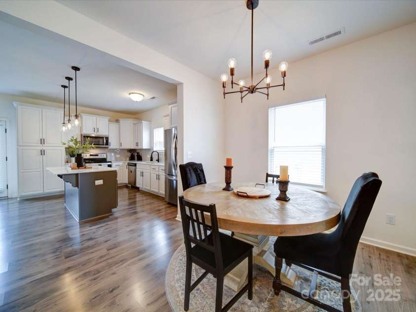 5121 Arbordale Way, Mount Holly, NC 28120.  MLS# CAR4269641, YatesRealty ID 18852. Another view of the Dining Area. Notice the open view of the Kitchen