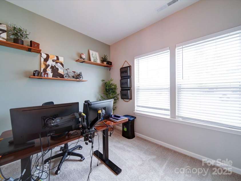 5121 Arbordale Way, Mount Holly, NC 28120.  MLS# CAR4269641, YatesRealty ID 18852. The Spacious Office off the Foyer has great natural lighting from the large windows.