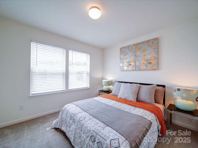 5121 Arbordale Way, Mount Holly, NC 28120.  MLS# CAR4269641, YatesRealty ID 18852. View of First Guest Bedroom on the Upper Level