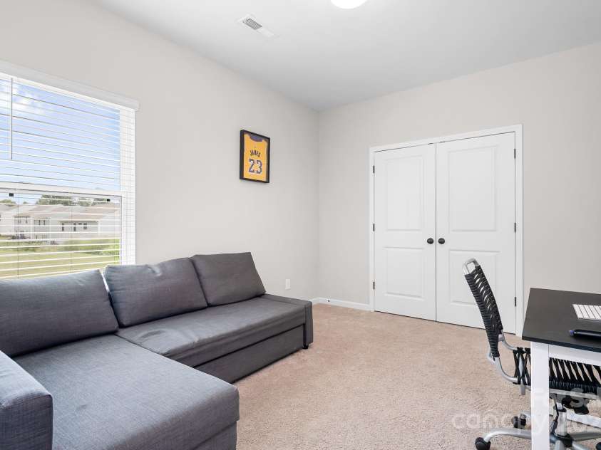 106 Tuppy Court, Statesville, NC 28625.  MLS# CAR4268805, YatesRealty ID 18853. Downstairs bedroom