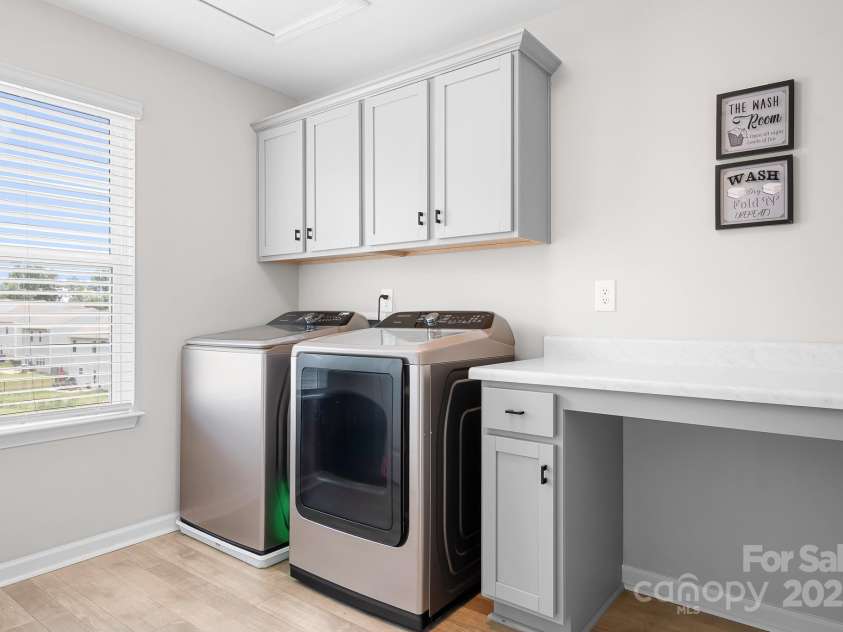 106 Tuppy Court, Statesville, NC 28625.  MLS# CAR4268805, YatesRealty ID 18853. Upstairs laundry