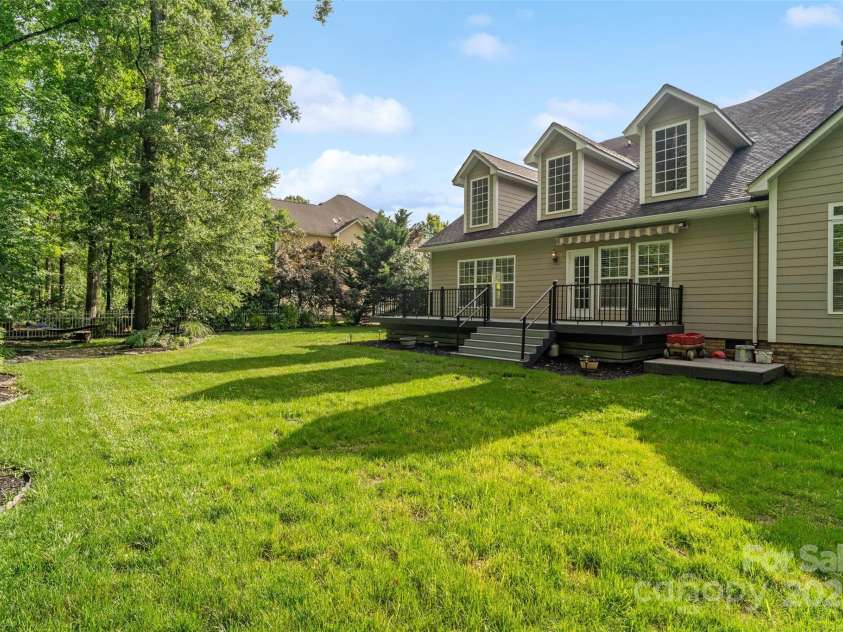 1812 Mill Chase Lane, Waxhaw, NC 28173.  MLS# CAR4270179, YatesRealty ID 18854. Backyard 1