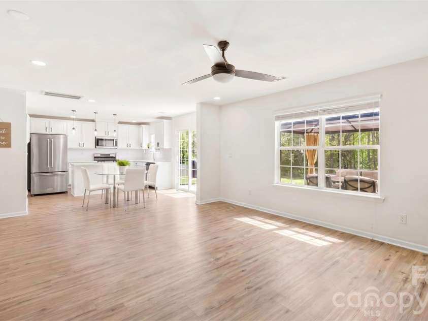 4715 Mcclure Road, Charlotte, NC 28216.  MLS# CAR4403073, YatesRealty ID 18855. Visualization of white cabinet & refrigerator upgrade