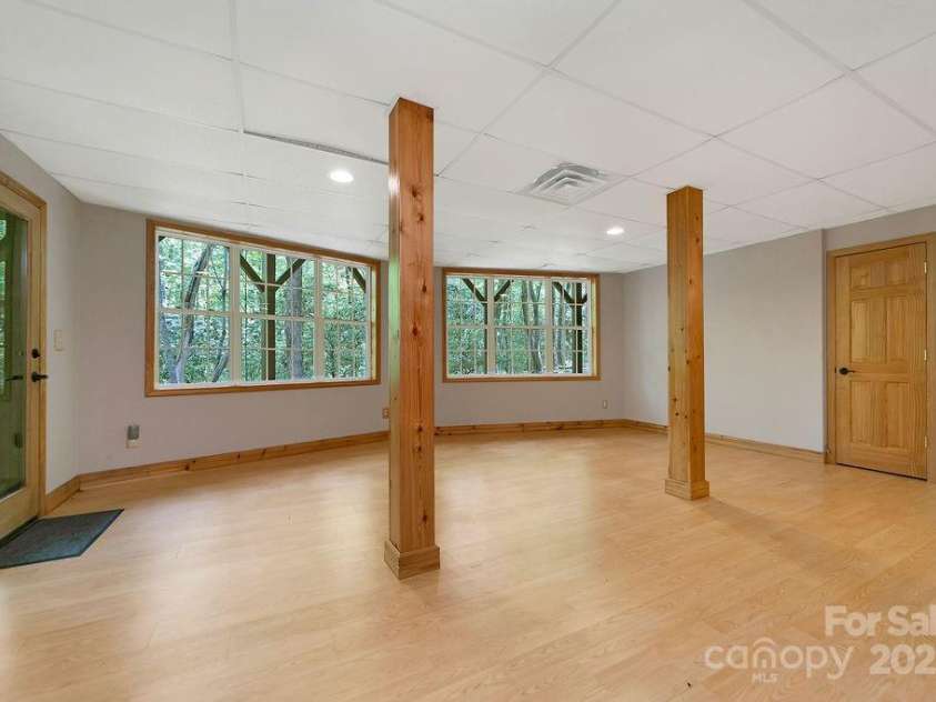 76 Isuhdavga Court, Brevard, NC 28712.  MLS# CAR4265815, YatesRealty ID 18859. Or Rec room?  Or second living area for guests?