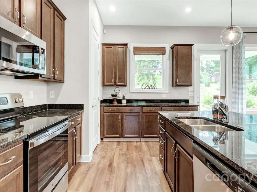 1043 Rabbit Hill Lane, Monroe, NC 28110.  MLS# CAR4222117, YatesRealty ID 1886. Model photos used for reference