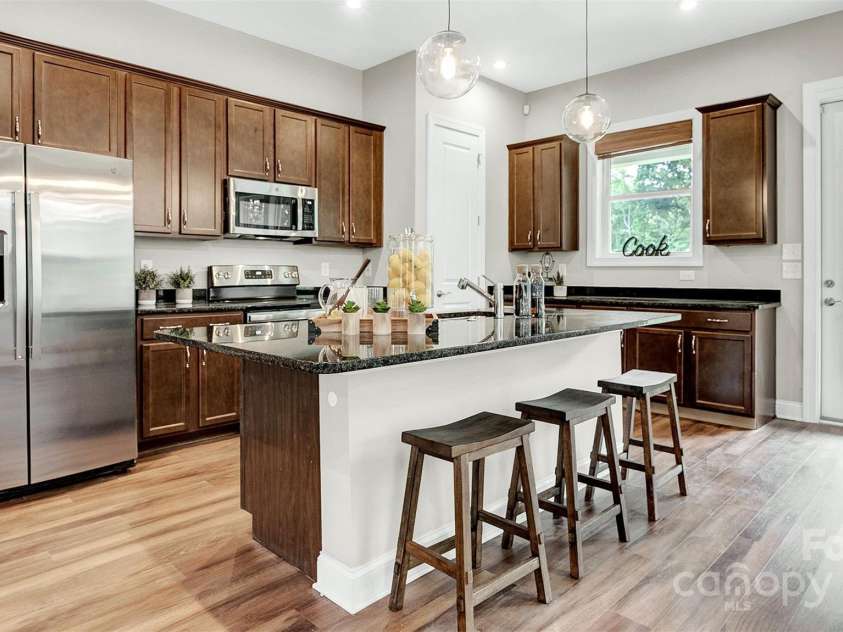 1043 Rabbit Hill Lane, Monroe, NC 28110.  MLS# CAR4222117, YatesRealty ID 1886. Model photos used for reference