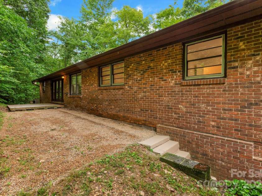137 Flynn Branch Road, Asheville, NC 28804.  MLS# CAR4258132, YatesRealty ID 18863. Back of house
