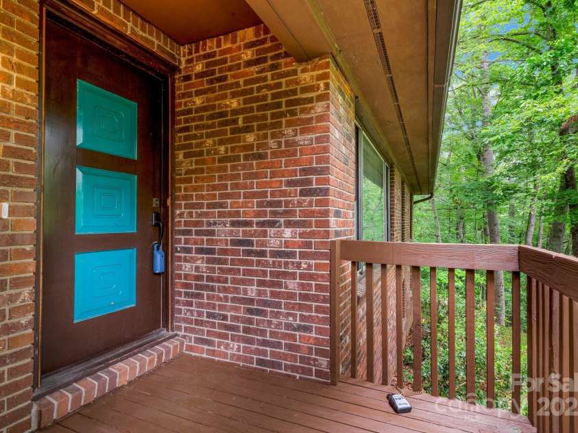 137 Flynn Branch Road, Asheville, NC 28804.  MLS# CAR4258132, YatesRealty ID 18863. Front porch