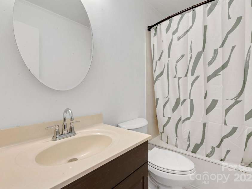 137 Flynn Branch Road, Asheville, NC 28804.  MLS# CAR4258132, YatesRealty ID 18863. Guest bathroom