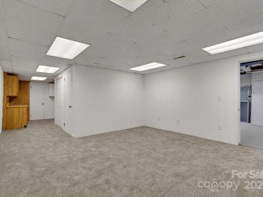 137 Flynn Branch Road, Asheville, NC 28804.  MLS# CAR4258132, YatesRealty ID 18863. Lower Level