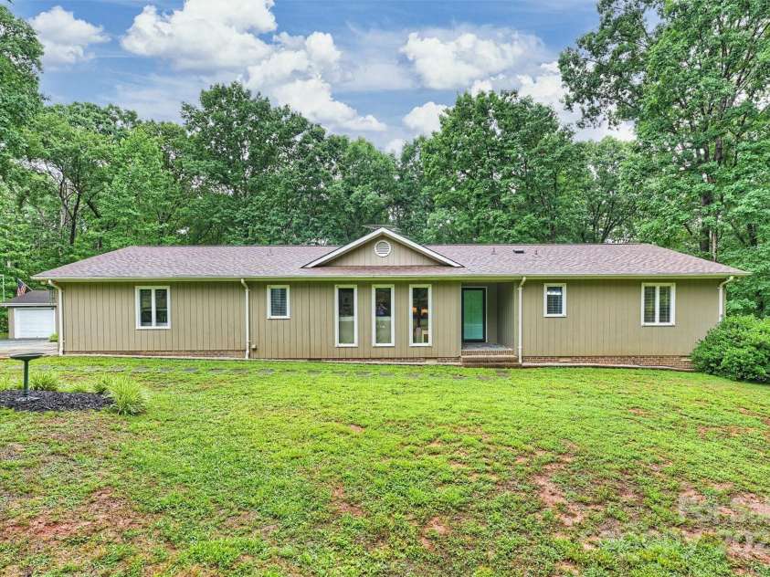 3017 Brooks Mill Lane, Wingate, NC 28174.  MLS# CAR4263524, YatesRealty ID 18864. Front view of home with 2.51 acres of Union County living