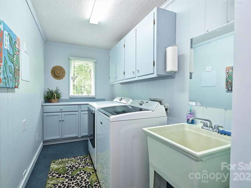 3017 Brooks Mill Lane, Wingate, NC 28174.  MLS# CAR4263524, YatesRealty ID 18864. Large laundry room-washer and dryer to convey