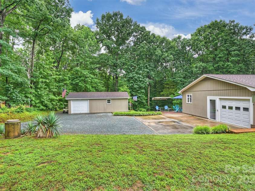 3017 Brooks Mill Lane, Wingate, NC 28174.  MLS# CAR4263524, YatesRealty ID 18864. Side entry to home with generous one car garage and storage room