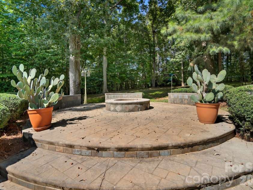 1300 Longleaf Court, Weddington, NC 28104.  MLS# CAR4306141, YatesRealty ID 18872. Built in fire pit
