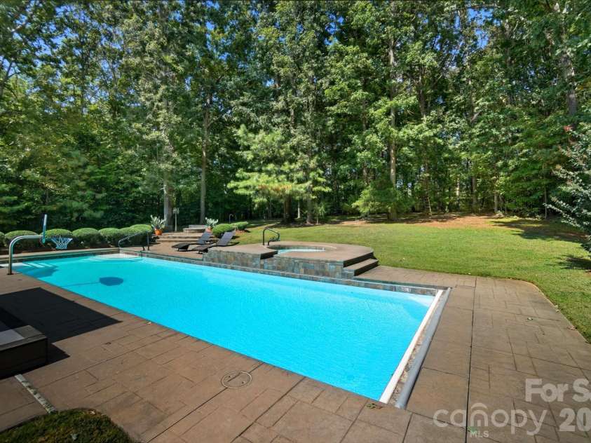 1300 Longleaf Court, Weddington, NC 28104.  MLS# CAR4306141, YatesRealty ID 18872. Heated pool