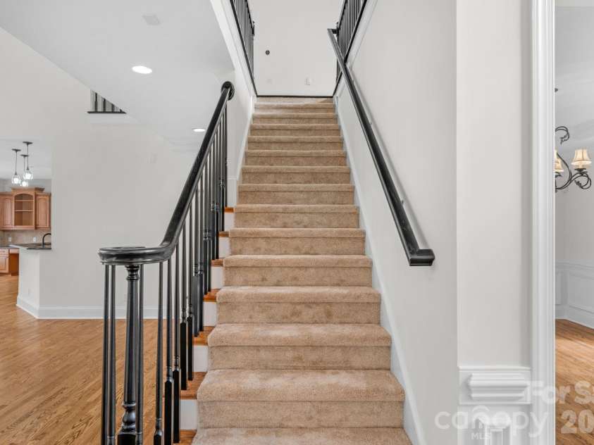 1300 Longleaf Court, Weddington, NC 28104.  MLS# CAR4306141, YatesRealty ID 18872. To second floor