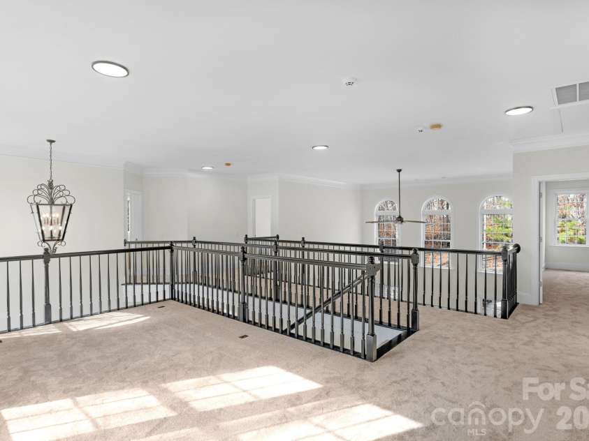 1300 Longleaf Court, Weddington, NC 28104.  MLS# CAR4306141, YatesRealty ID 18872. Upper level loft