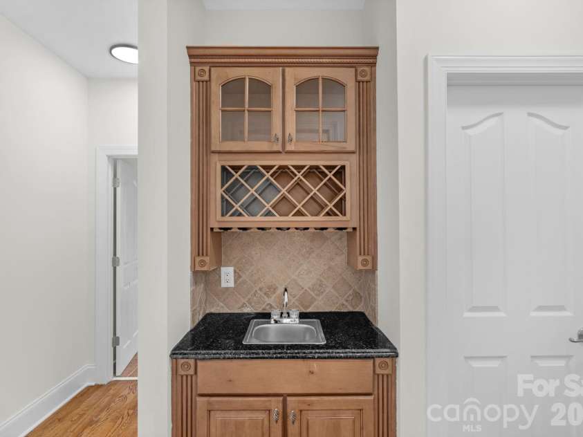 1300 Longleaf Court, Weddington, NC 28104.  MLS# CAR4306141, YatesRealty ID 18872. Wine nook