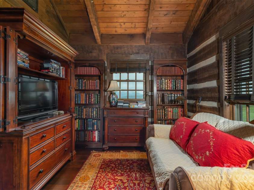 143 Daniel Boone Trail, Burnsville, NC 28714.  MLS# CAR4261449, YatesRealty ID 18872. Bedroom boasts extra space for a comfortable sitting nook