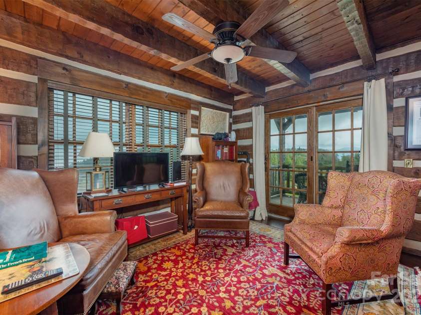 143 Daniel Boone Trail, Burnsville, NC 28714.  MLS# CAR4261449, YatesRealty ID 18872. Charming visiting/reading area off the kitchen