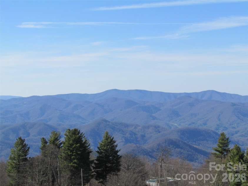 143 Daniel Boone Trail, Burnsville, NC 28714.  MLS# CAR4261449, YatesRealty ID 18872. One never tires of a view like this