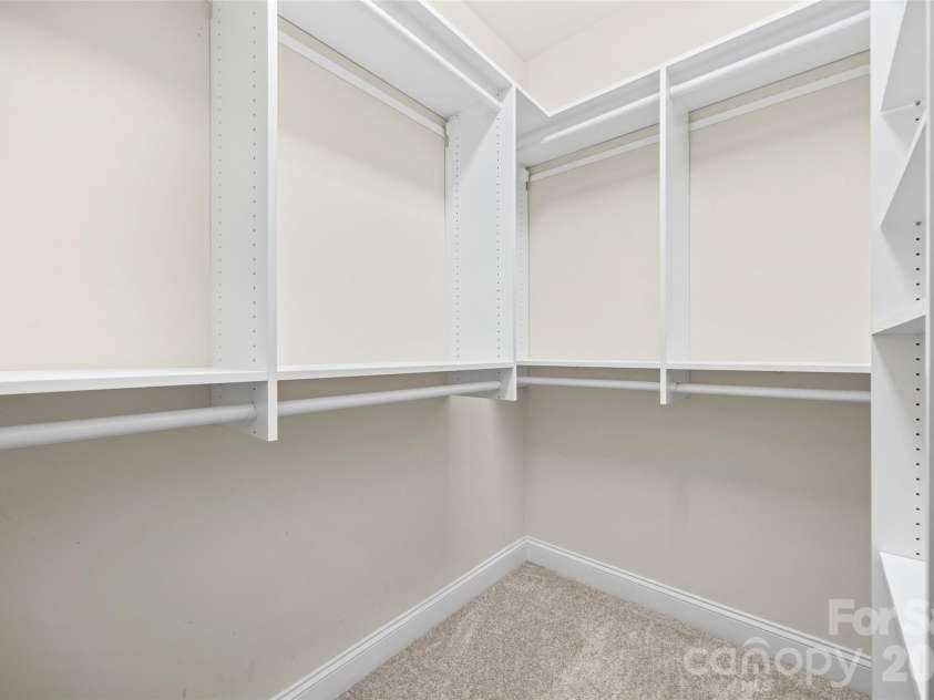 8029 Whitehawk Hill Road, Waxhaw, NC 28173.  MLS# CAR4422211, YatesRealty ID 18874. Primary suite closet