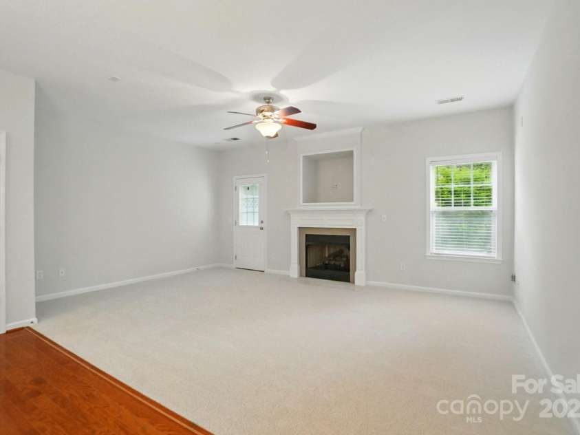 310 Rose Garden Court, Rock Hill, SC 29732.  MLS# CAR4202341, YatesRealty ID 18877. Family Room with gas fireplace and brand new carpet.