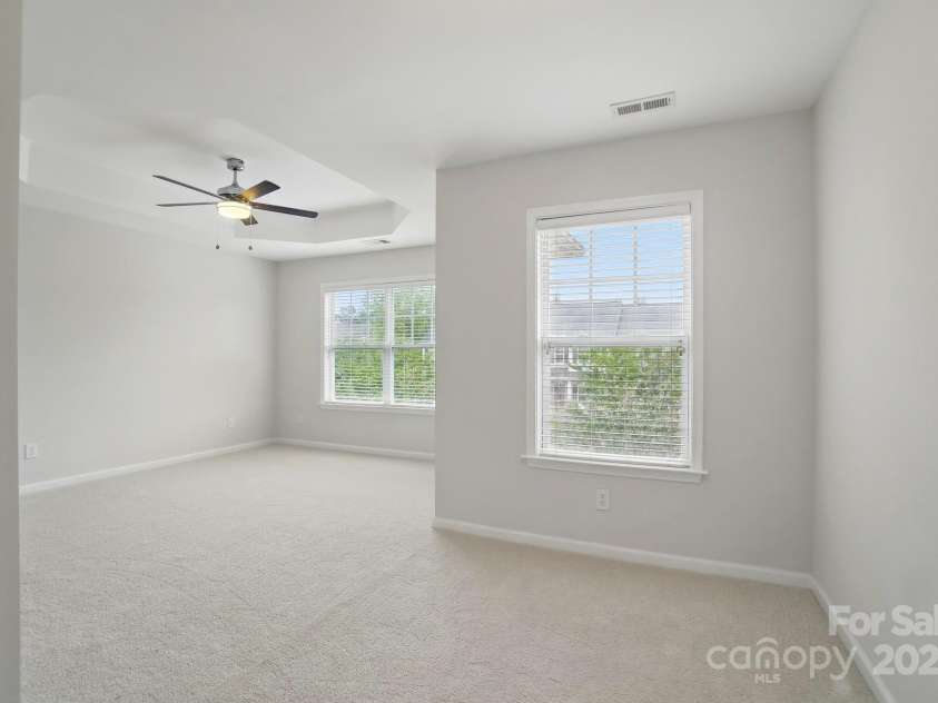 310 Rose Garden Court, Rock Hill, SC 29732.  MLS# CAR4202341, YatesRealty ID 18877. Spacious Primary Suite has tray ceiling.