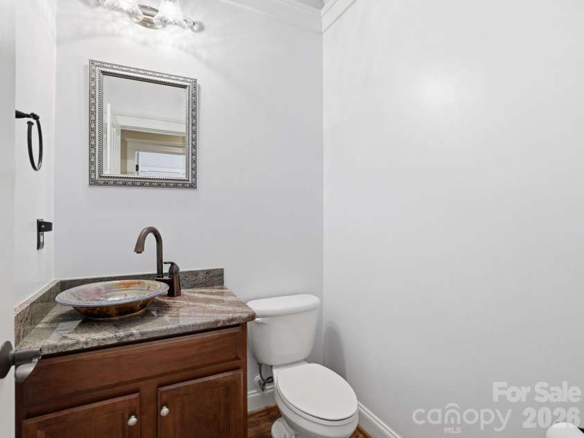 1177 Windsong Bay Lane, Tega Cay, SC 29708.  MLS# CAR4369095, YatesRealty ID 18879. Half Bath Main Level