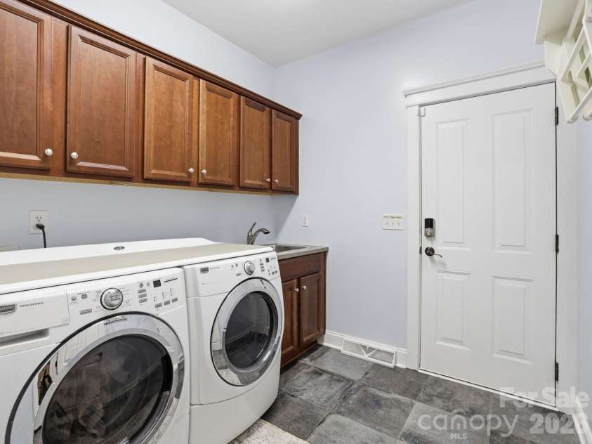 1177 Windsong Bay Lane, Tega Cay, SC 29708.  MLS# CAR4369095, YatesRealty ID 18879. Laundry Off Garage