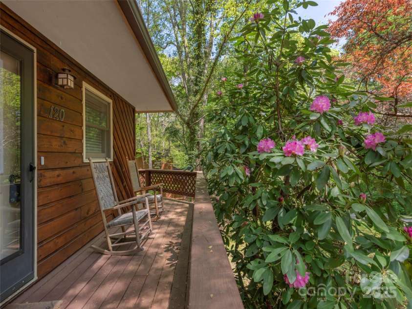 120 Blue Jay Loop, Maggie Valley, NC 28751.  MLS# CAR4242766, YatesRealty ID 18880. Rocking chairs and rhododendrons welcome you to your charming Maggie Valley retreat.