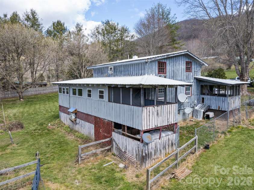 838 Hidden Valley Road, Clyde, NC 28721.  MLS# CAR4364695, YatesRealty ID 18881. Master bedroom addition with private porch