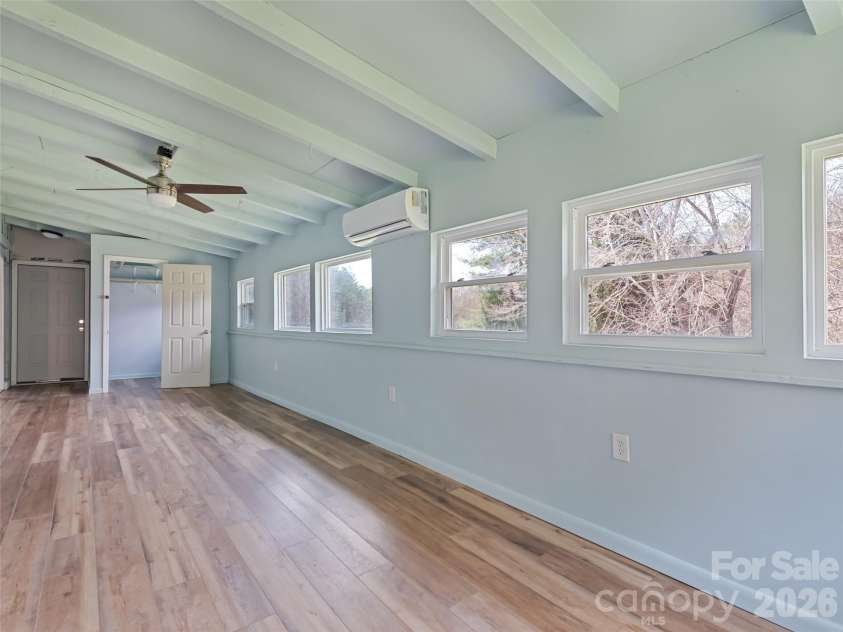 838 Hidden Valley Road, Clyde, NC 28721.  MLS# CAR4364695, YatesRealty ID 18881. Master Bedroom is bright and spacious