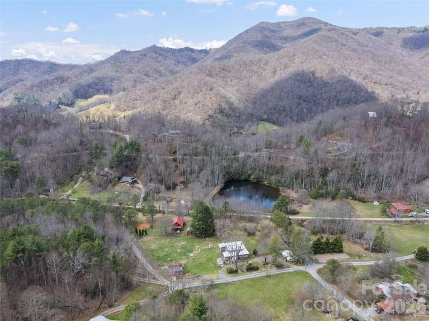 838 Hidden Valley Road, Clyde, NC 28721.  MLS# CAR4364695, YatesRealty ID 18881. Overlooking the house toward Crabtree Bald