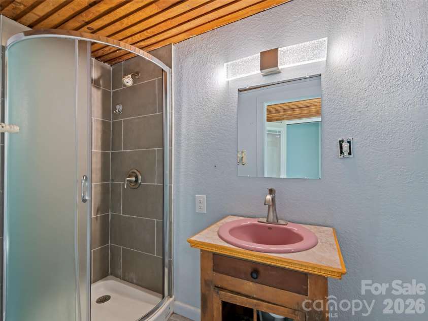 838 Hidden Valley Road, Clyde, NC 28721.  MLS# CAR4364695, YatesRealty ID 18881. Primary suite bathroom
