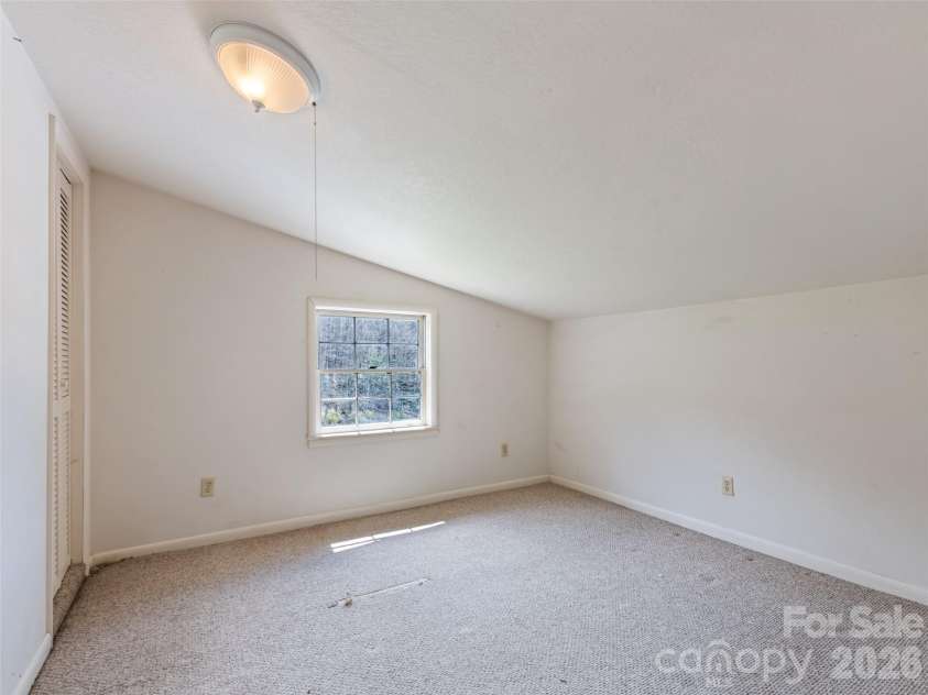 838 Hidden Valley Road, Clyde, NC 28721.  MLS# CAR4364695, YatesRealty ID 18881. Upstairs Room 1