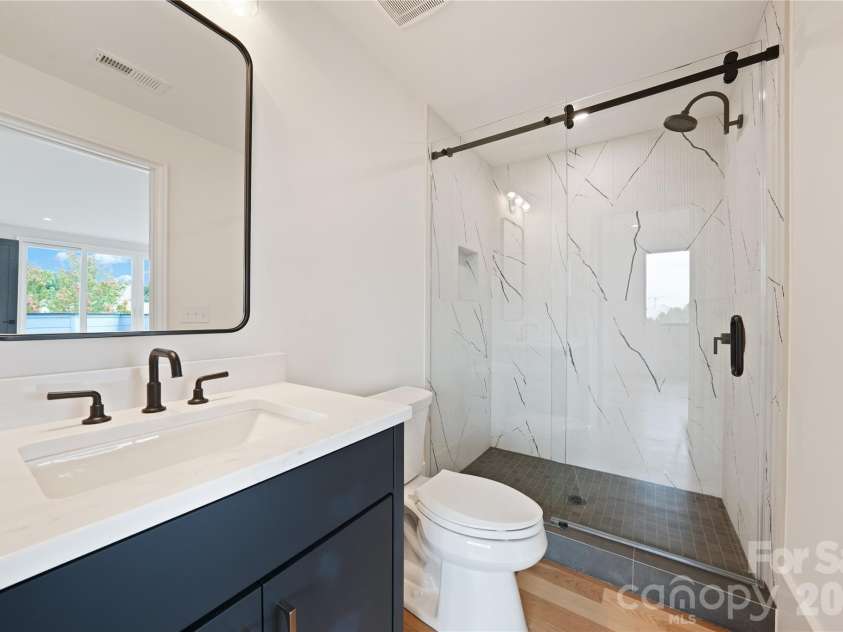 1511 Waverly Avenue, Charlotte, NC 28203.  MLS# CAR4335309, YatesRealty ID 18882. Upper Level Bathroom