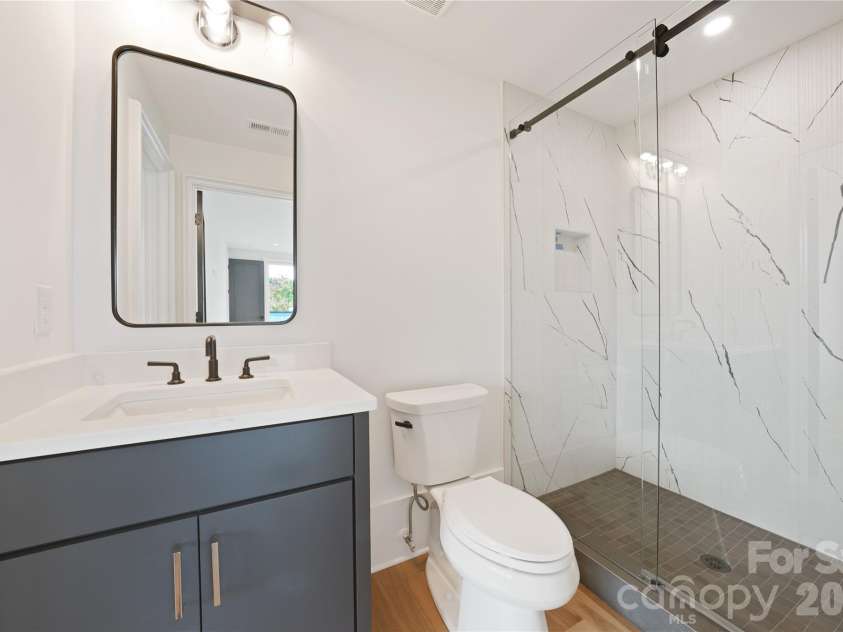1511 Waverly Avenue, Charlotte, NC 28203.  MLS# CAR4335309, YatesRealty ID 18882. Upper Level Bathroom
