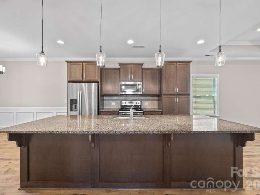 24522 Blue Heron Circle, Lancaster, SC 29720.  MLS# CAR4375579, YatesRealty ID 18885. Kitchen with island