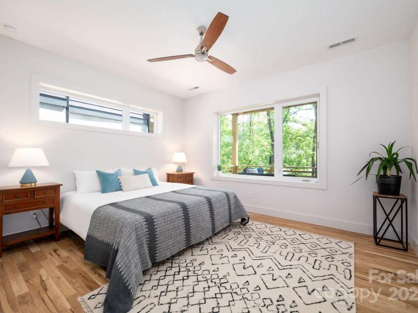 9 Orrinel Way, Asheville, NC 28806.  MLS# CAR4257922, YatesRealty ID 18885. Basement Bedroom with Modern Ceiling Fan