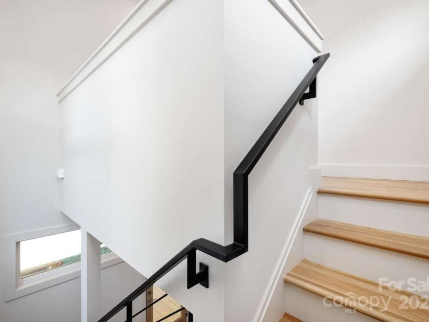 9 Orrinel Way, Asheville, NC 28806.  MLS# CAR4257922, YatesRealty ID 18885. Custom Steel Railing and Solid Wood Stairs
