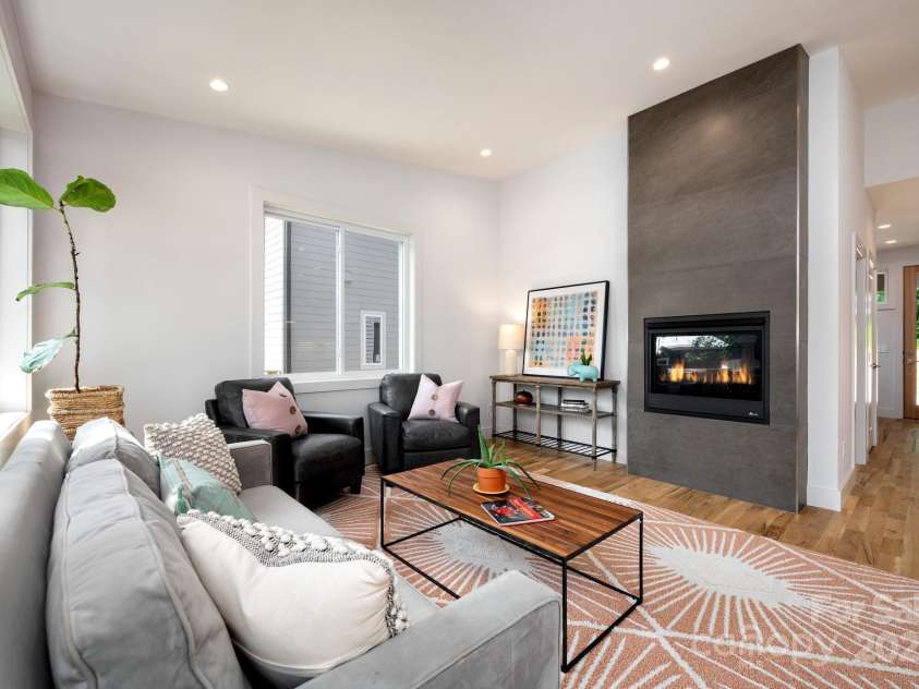 9 Orrinel Way, Asheville, NC 28806.  MLS# CAR4257922, YatesRealty ID 18885. Floor-to-Ceiling, Tile-Surround Gas Fireplace