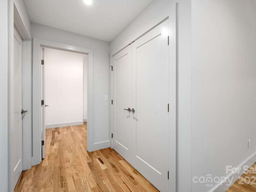 9 Orrinel Way, Asheville, NC 28806.  MLS# CAR4257922, YatesRealty ID 18885. Large Garment Closet in Basement
