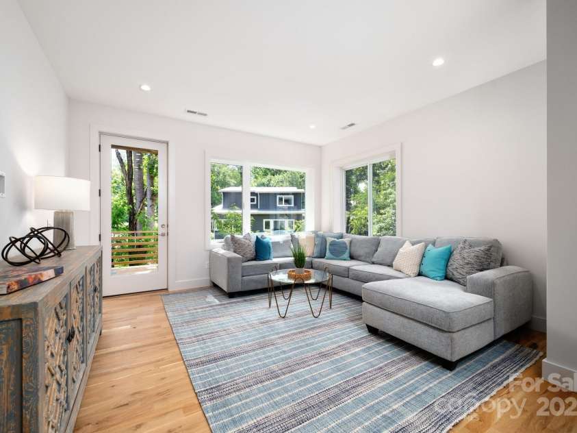 9 Orrinel Way, Asheville, NC 28806.  MLS# CAR4257922, YatesRealty ID 18885. Large Second Living Room with Deck Access