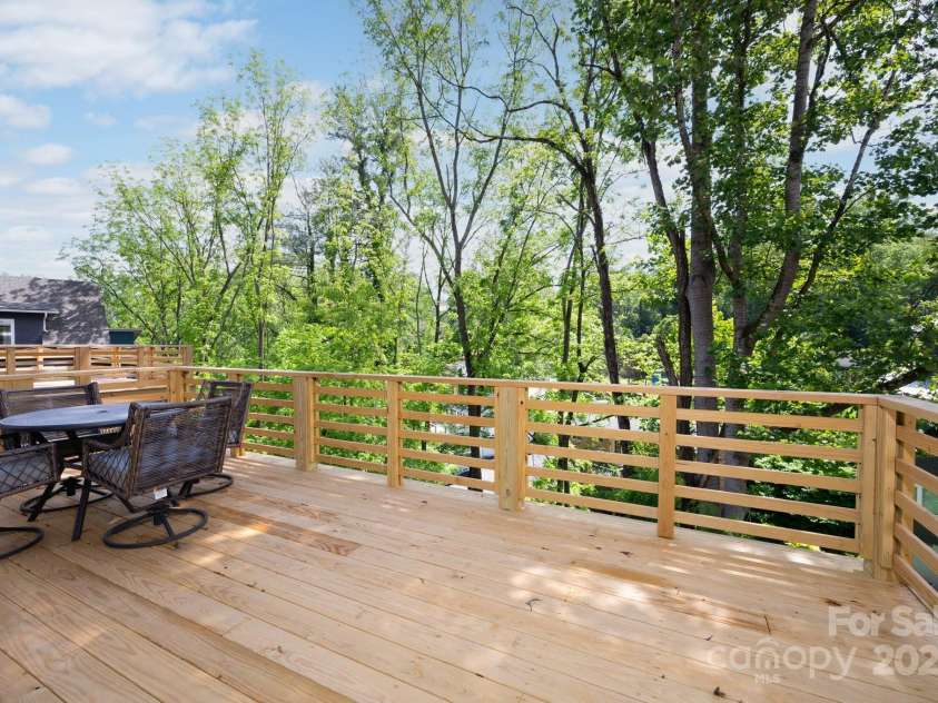 9 Orrinel Way, Asheville, NC 28806.  MLS# CAR4257922, YatesRealty ID 18885. Sunny Back Deck Perfect for Gatherings
